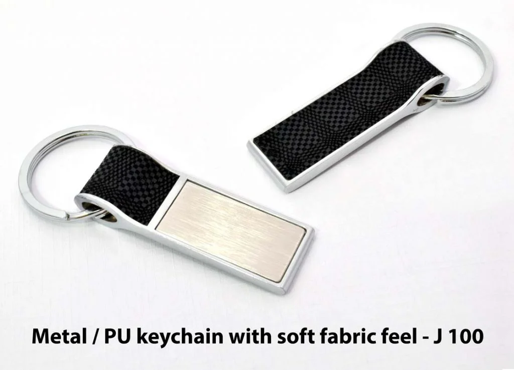 J100 – Metal / PU keychain with soft fabric feel